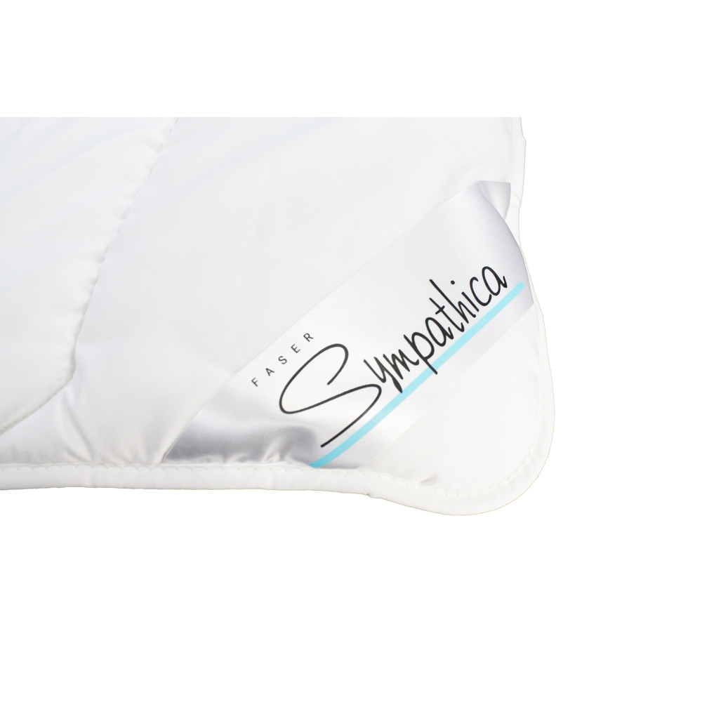 Bettdeckenecke mit Label